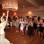 Bouquet toss during wedding at the Historic Summit Inn